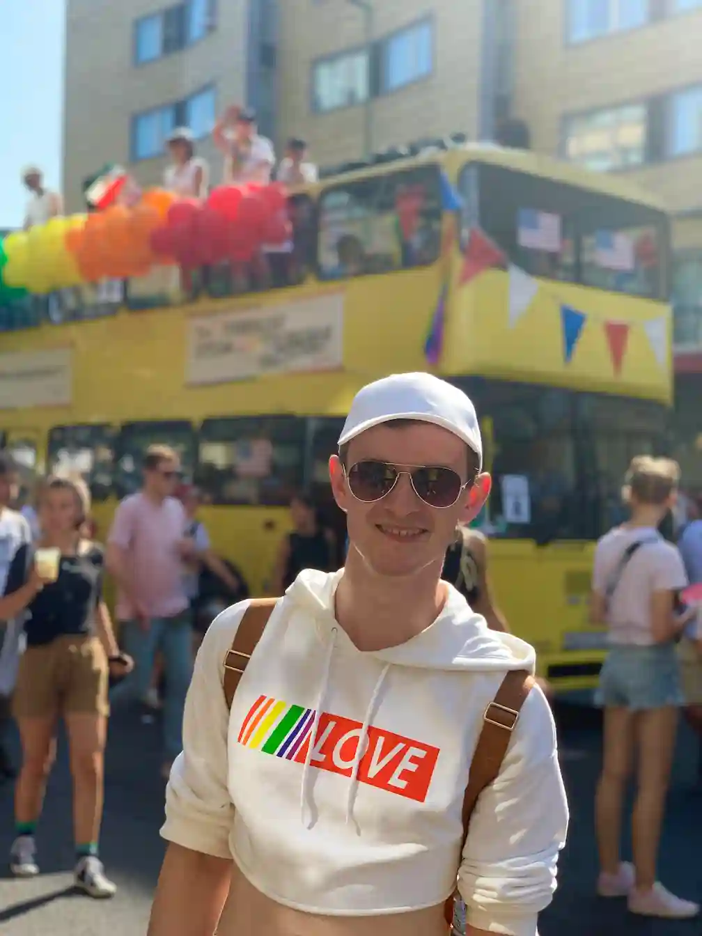 Alex wearing a Love Wins top while celebrating pride at Berlin pride
